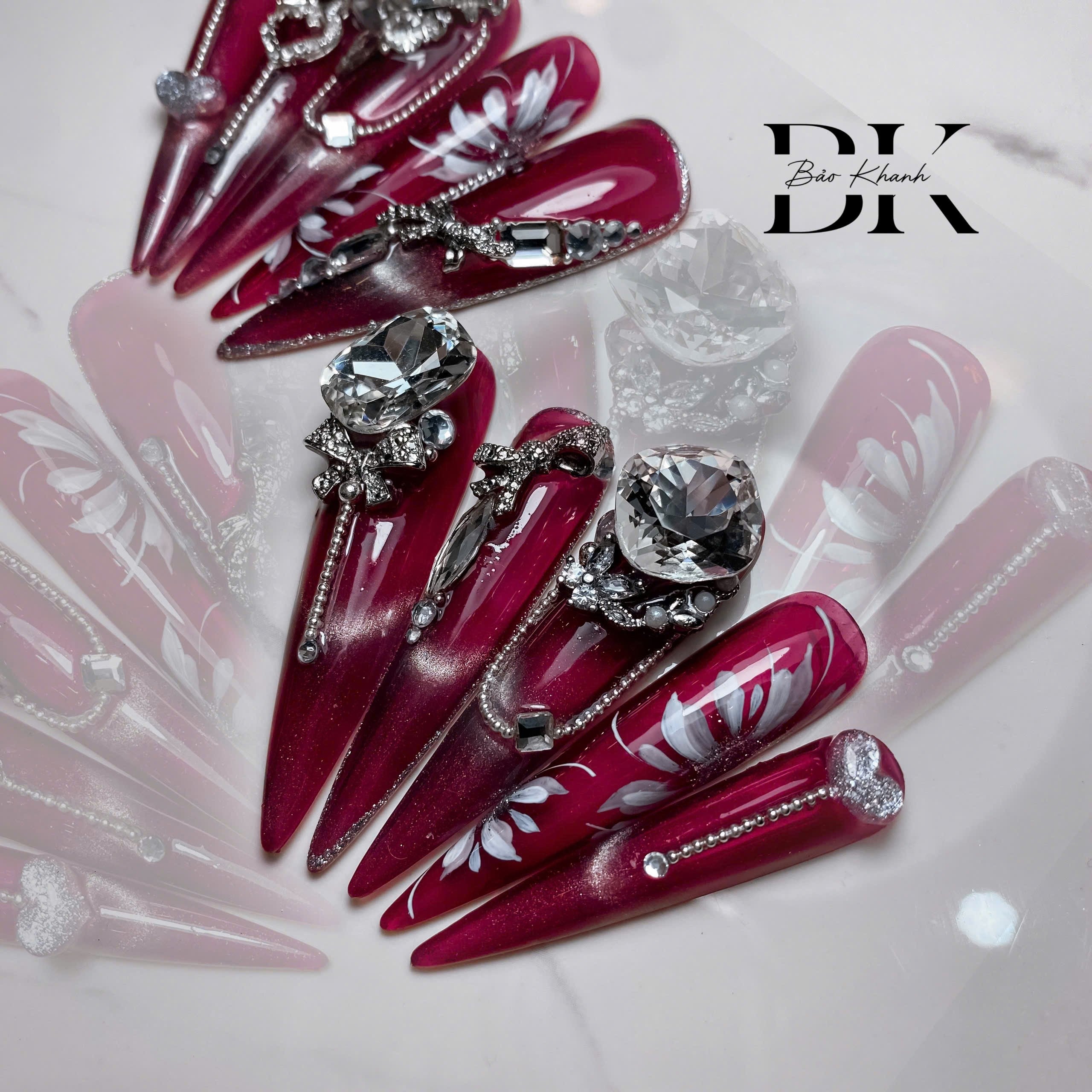 Handmade Burgundy Stiletto Press-On Nails – Elegant 3D Crystal Rhinestones with White Floral Nail Art Design